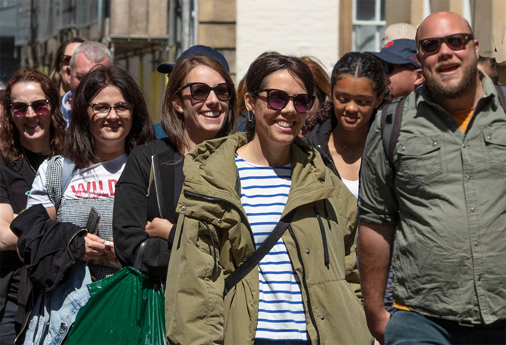 Guests laughing during the Blackbeard to Banksy walking tour in Bristol