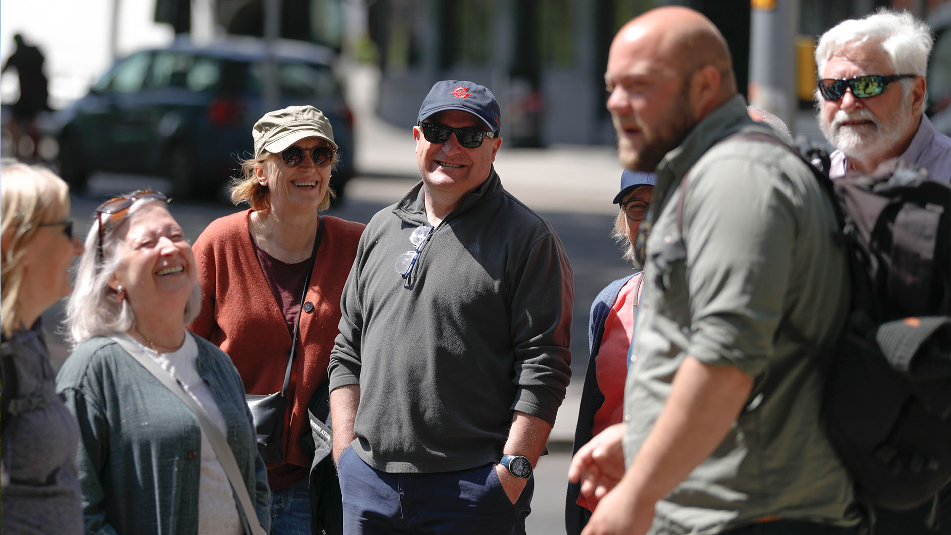 People laughing on a Bristol walking tour